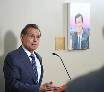 Former Denver Mayor Federico F. Peña speaks at the Federico F. Peña Family Health Center after a portrait unveiling.